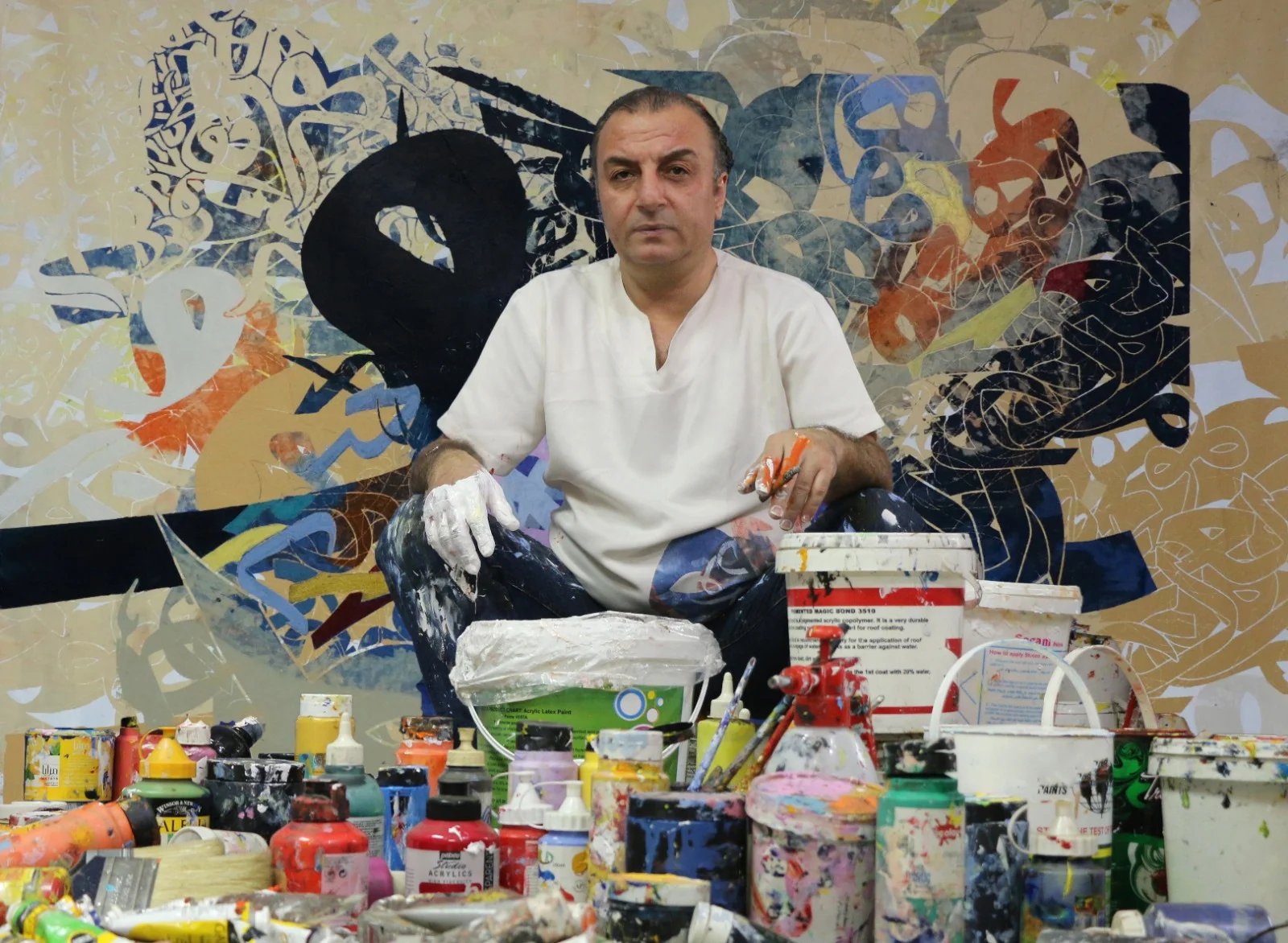 Khaled Tirikli working in his art studio